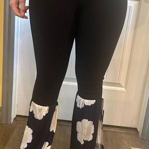 Black UpCycled, boho Flared Pants with White Floral Design.